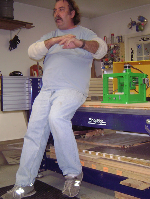 Bill shows off a small CNC which was cut out of recycled plastic.
