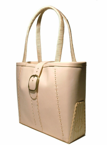 Bag made of leather and ash veneer wood. Sidney had been invited by celebrity stylist Elizabeth Stewart to contribute an original handbag to be auctioned at The Bag Lunch charity event of PS Arts.org, a non-profit dedicated to improving children's lives through arts education.