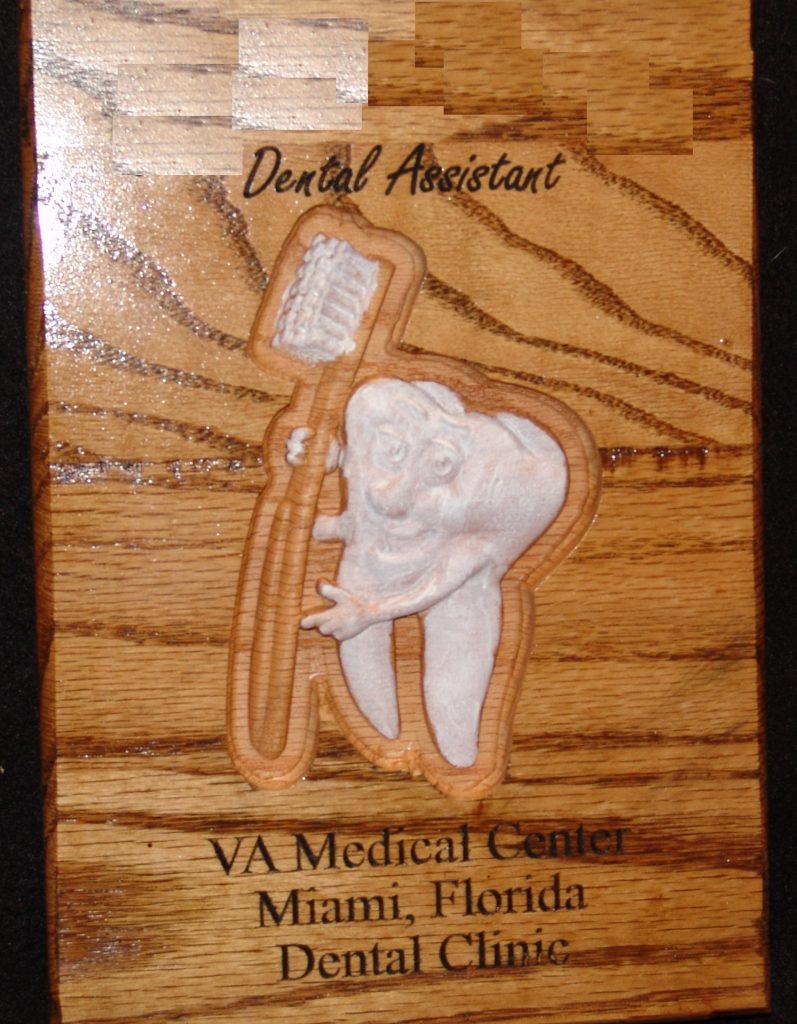 a plaque for miami va medical center dental assistant