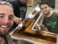 Andy with a couple of guys in the shop.